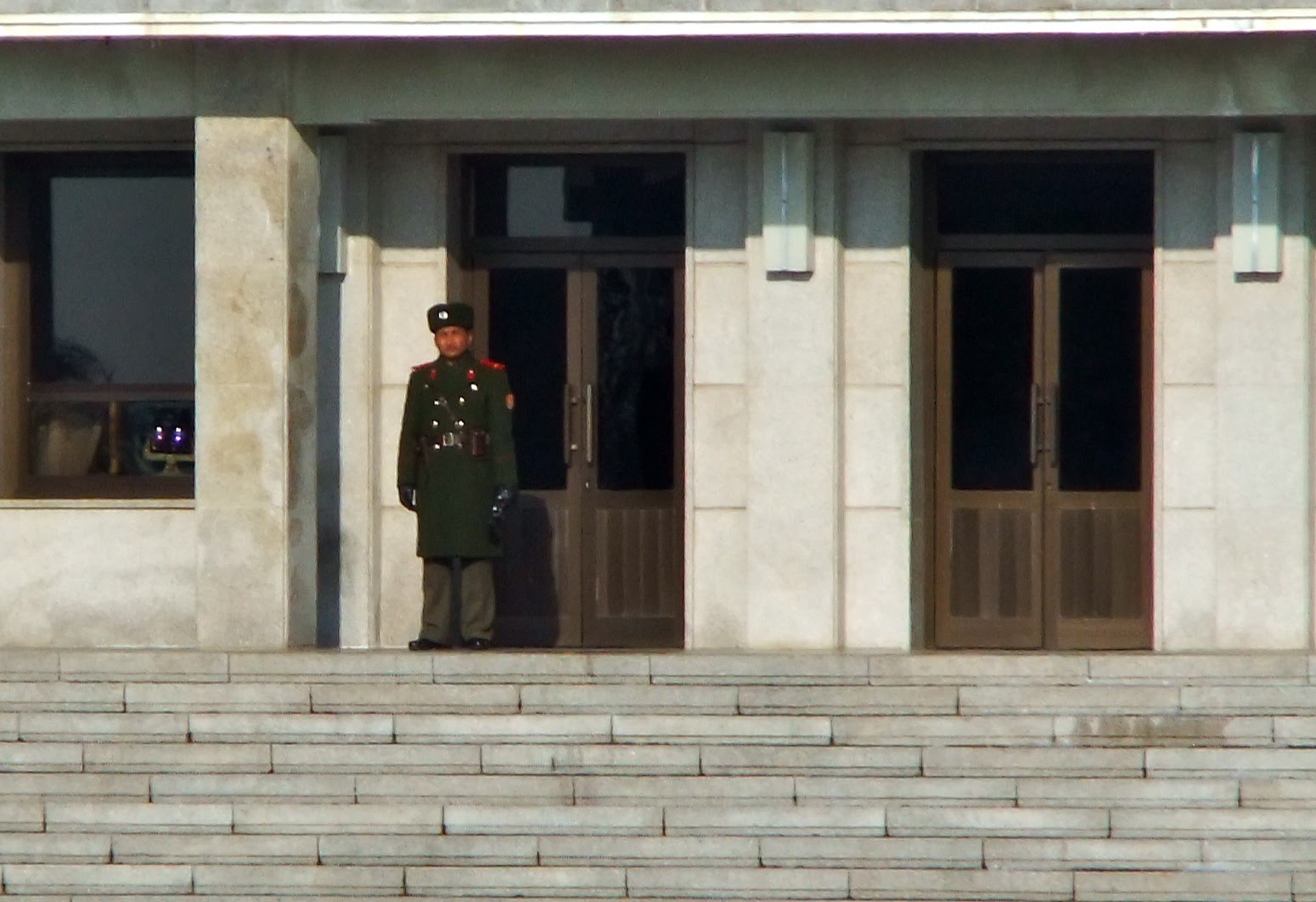 Smiley North Korean Border Guard Looks At Us From Afar 4256405532 O