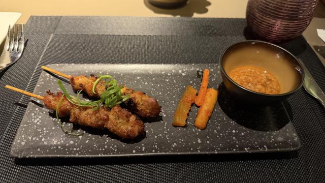 A chicken satay in Qatar&rsquo;s lounge