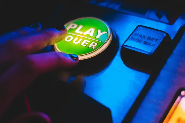 A big green button marked play - pic Erik Mclean, Unsplash